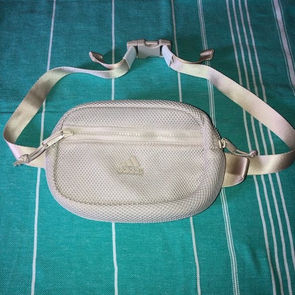 adidas Handbags - Adidas Beige Fanny Pack with zipper pockets